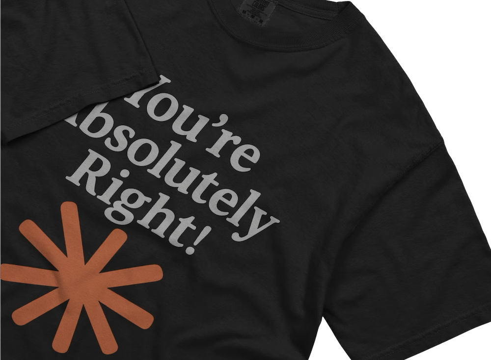 A black t-shirt with the Claude logo saying "You're absolutely right!"
