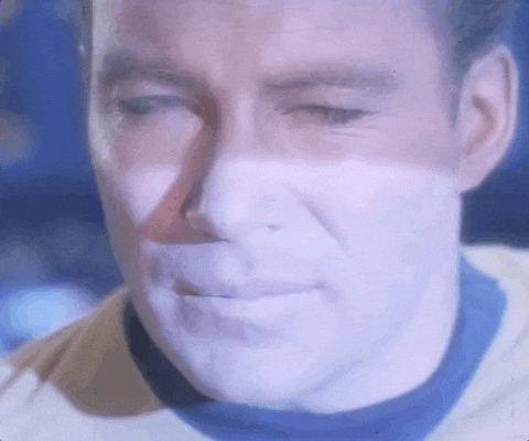 A Star Trek gif with Spock, Kirk and Uhura covering their eyes